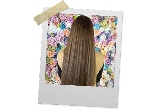 Lang haar met warme kleur, geknipt en geföhnd